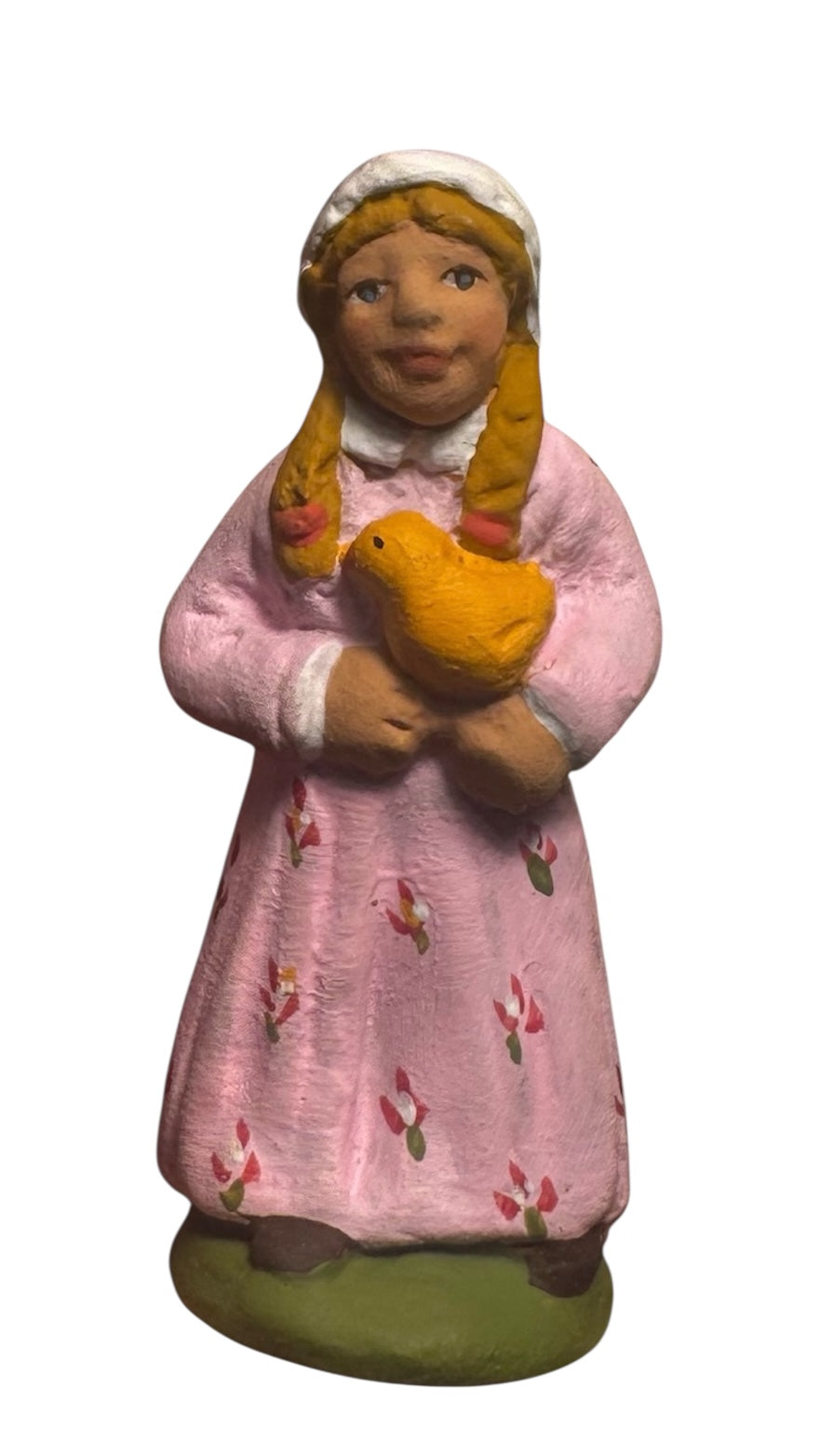 Petite fille au poussin